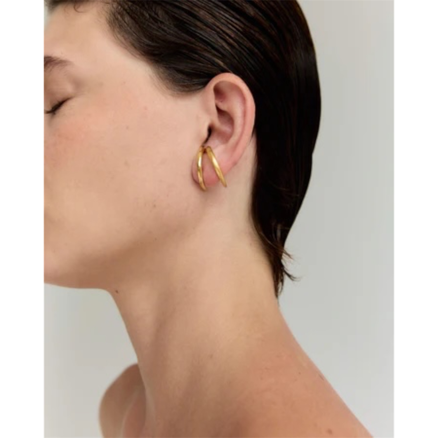 Golden earpiece eclipse | Adorn