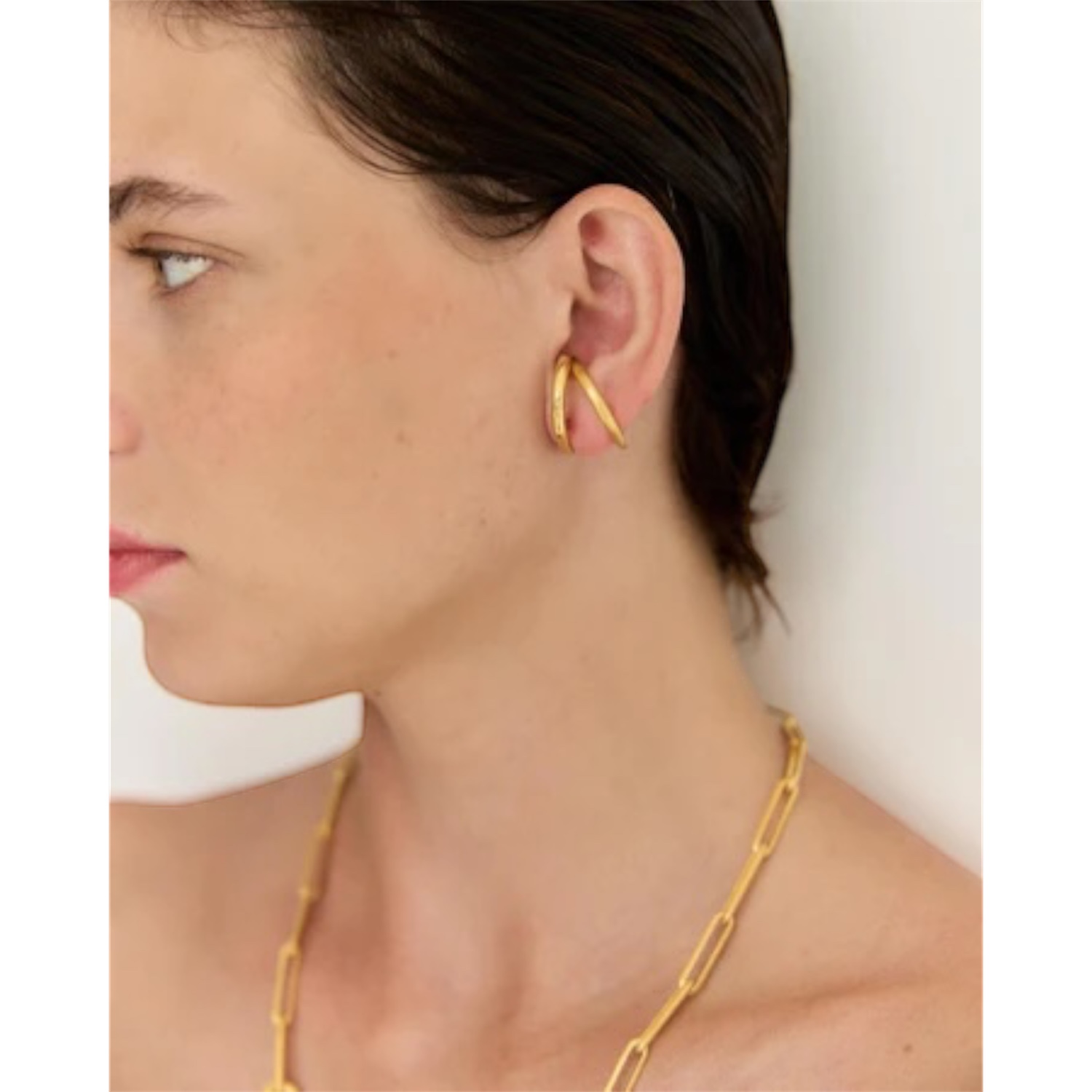 Golden earpiece eclipse | Adorn